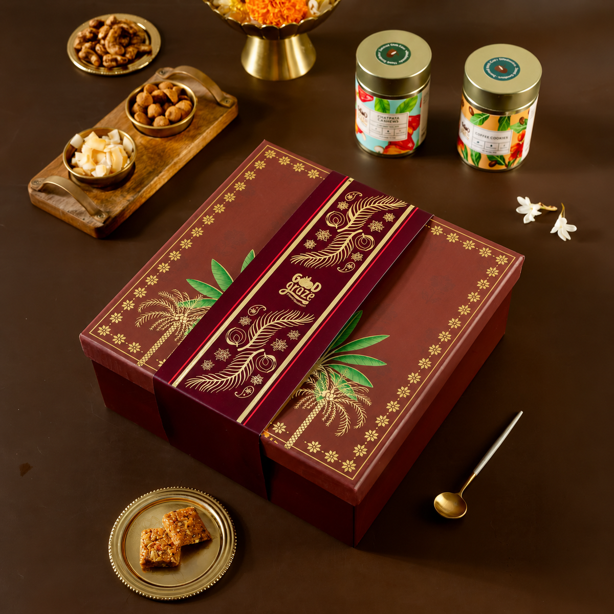 Crimson Canopy Reserve gourmet client hamper with chatpata cashews, coffee cookies, oats and almond bites and coconut chips