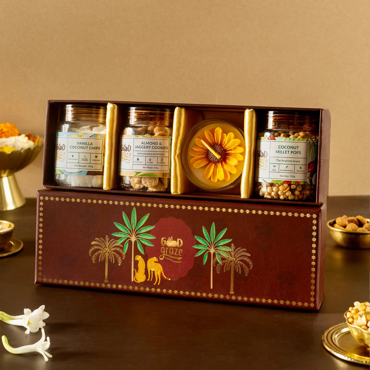 Crimson Canopy Diwali gift hamper with scented candle by Good Graze